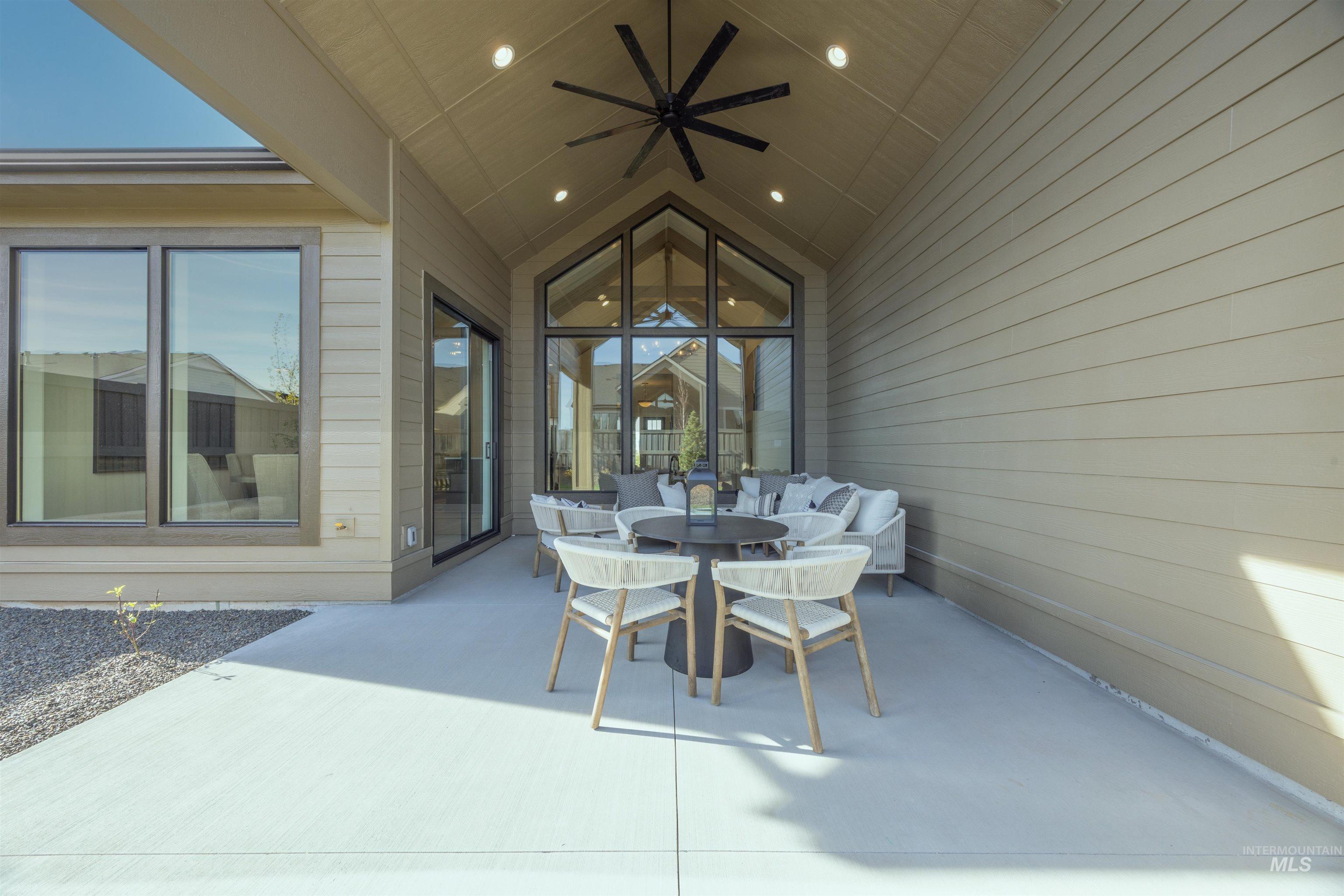 948 East Escalation Street Meridian, ID 83642 - Photo 35 of 44 View of patio / terrace featuring outdoor dining area and a ceiling fan