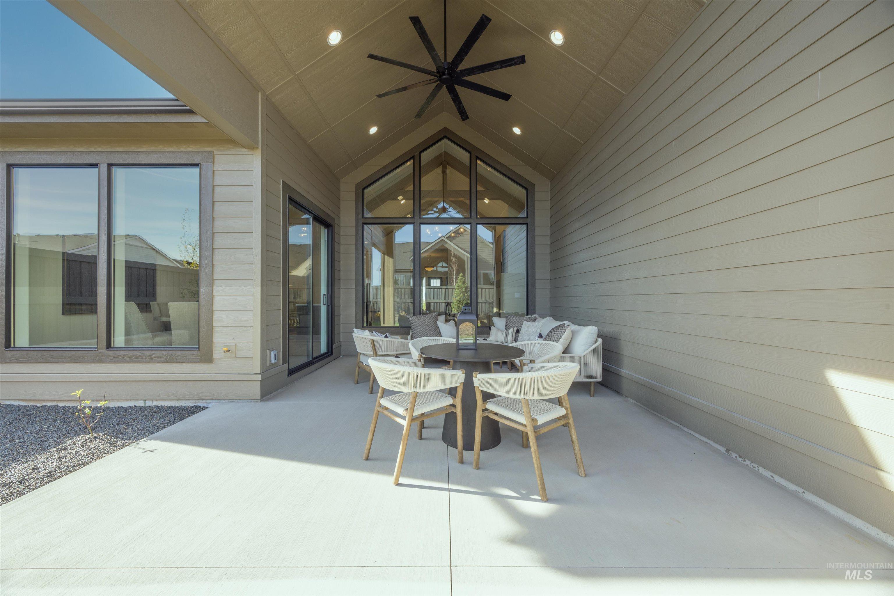 948 East Escalation Street Meridian, ID 83642 - Photo 36 of 44 View of patio / terrace with outdoor dining area and a ceiling fan