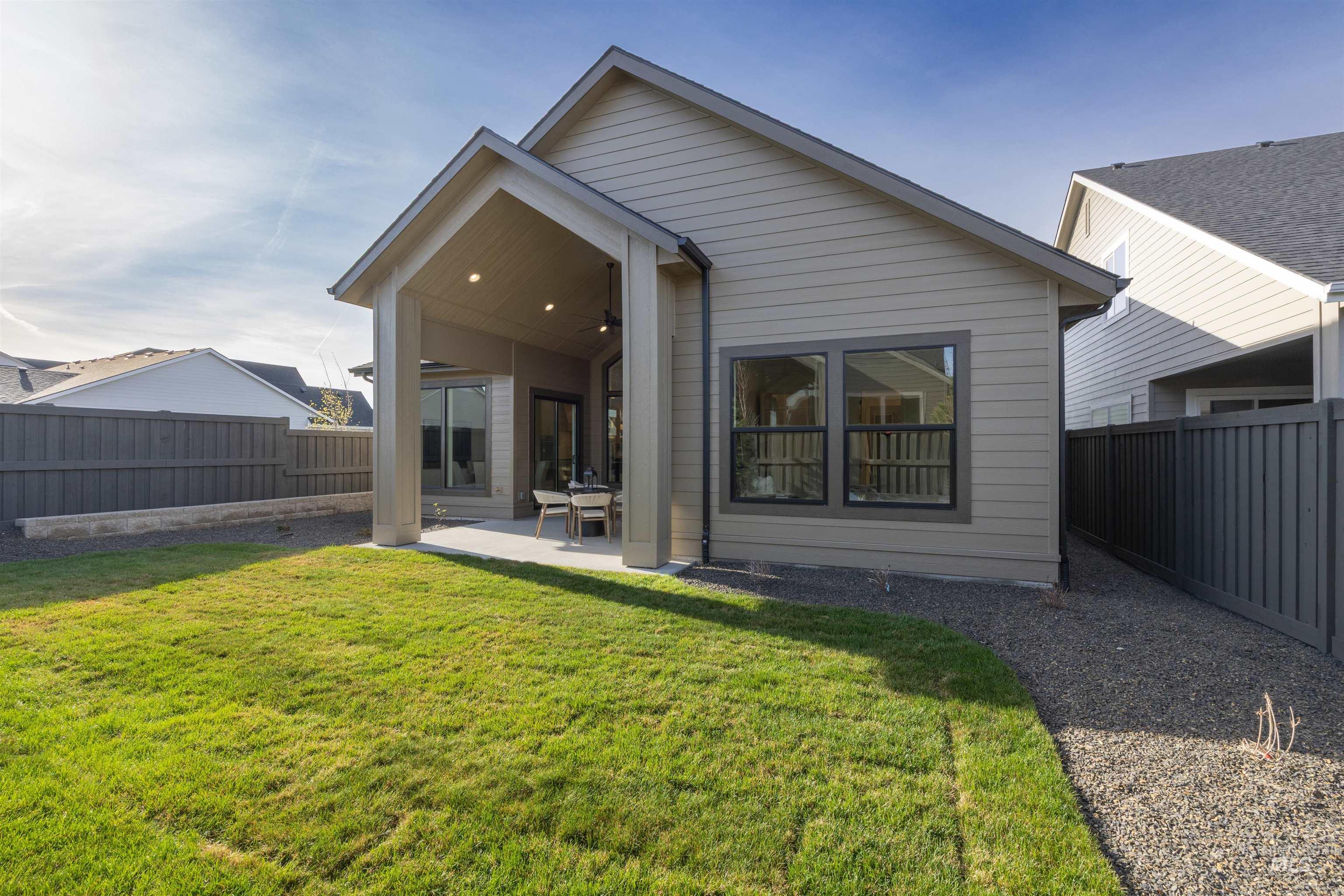 948 East Escalation Street Meridian, ID 83642 - Photo 39 of 44 Rear view of property with a patio and a fenced backyard