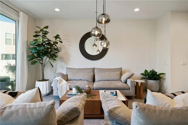 a view of a hallway with a door and stairs