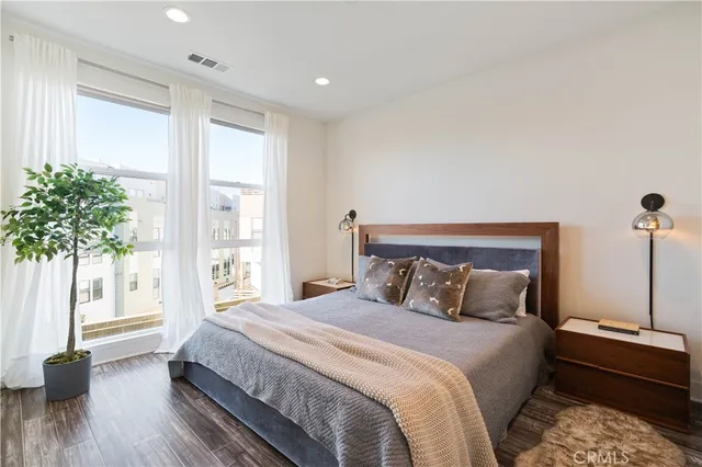 a kitchen with kitchen island a counter top space appliances and cabinets