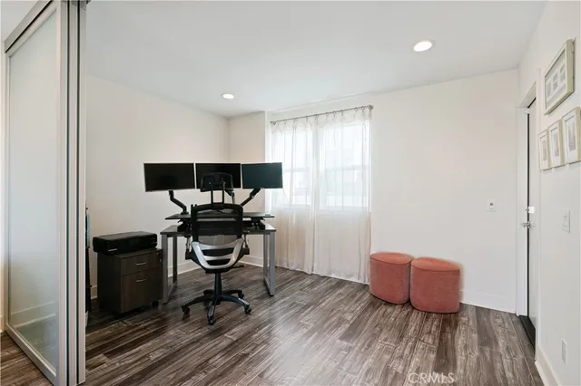 a close view of a utility room with dryer and washer