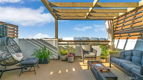 a living room with furniture or couch and a flat screen tv