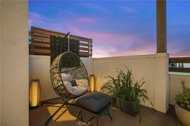 a view of workspace filled with furniture and wooden floor