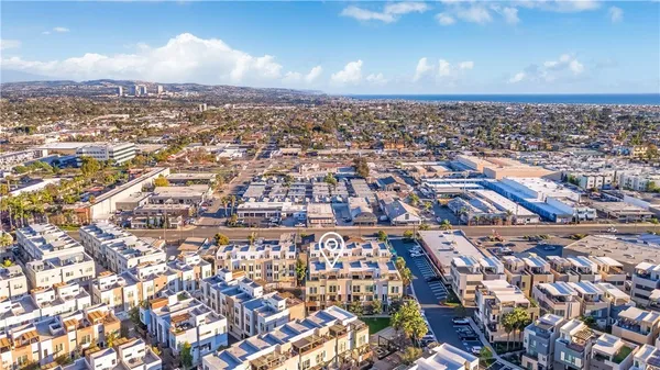 a view of a chairs and table in the patio