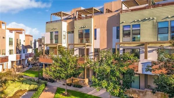 a picture of a bench in front of a building