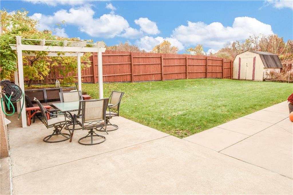 1107 Rankin Road White Oak, PA 15131 - Photo 19 of 21 Level backyard with shed for extra storage.