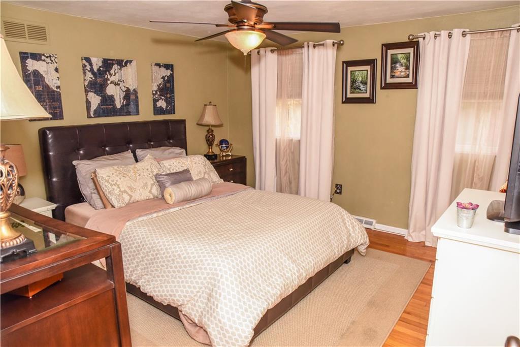 1107 Rankin Road White Oak, PA 15131 - Photo 8 of 21 Spacious master bedroom has neutral colors.