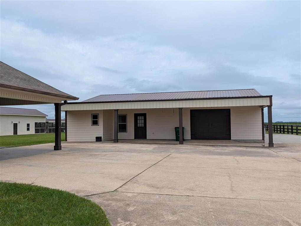 11480 Blanchard Road Welsh, LA 70591 - Photo 32 of 48 Exterior with lots of concrete and covered porches