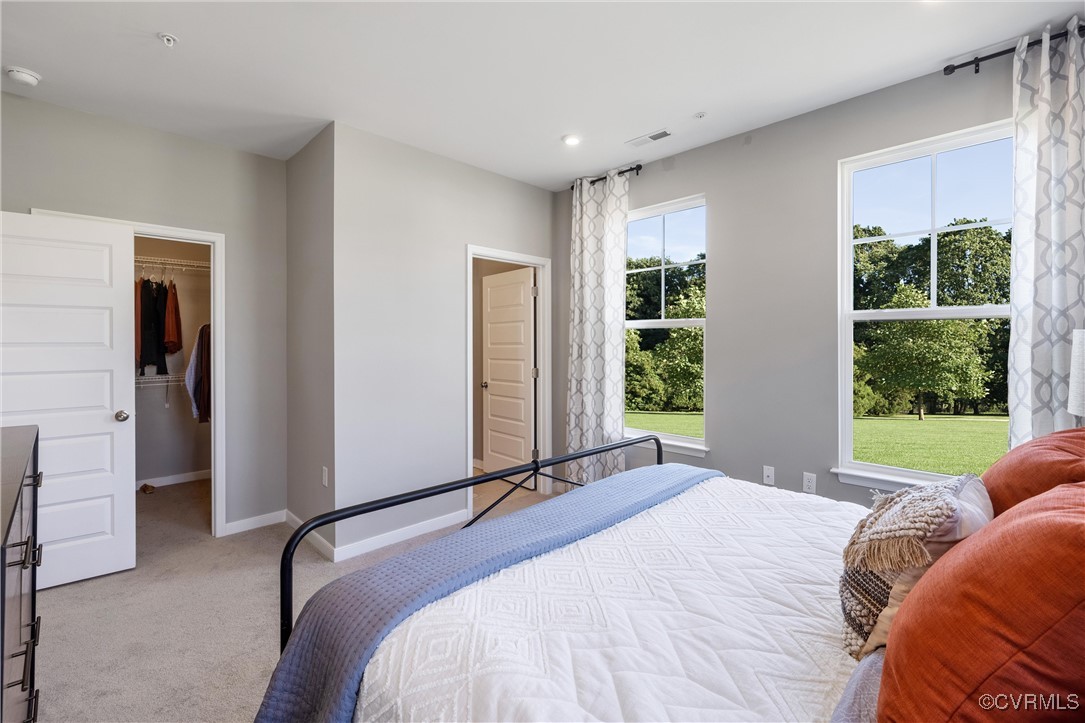 4112 Ebbies Crossing Midlothian, VA 23112 - Photo 13 of 38 a bedroom with a bed and a window