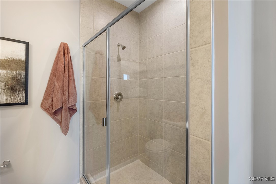 4112 Ebbies Crossing Midlothian, VA 23112 - Photo 15 of 38 a bathroom with a shower and a sink
