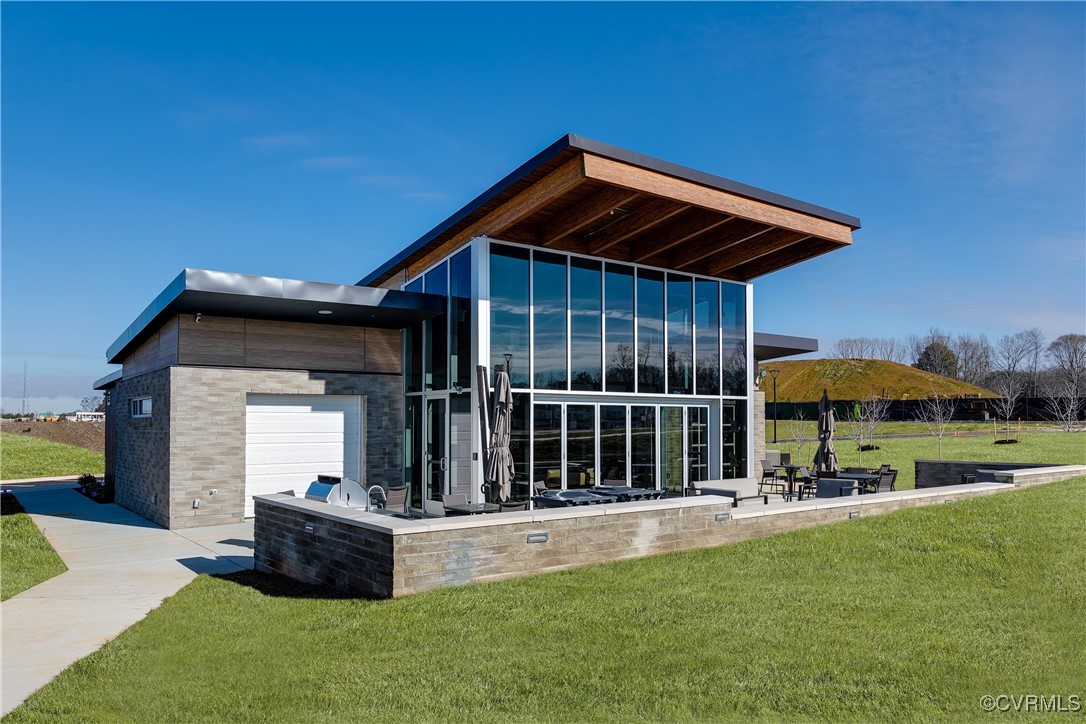 4112 Ebbies Crossing Midlothian, VA 23112 - Photo 21 of 38 a front view of a house with a yard