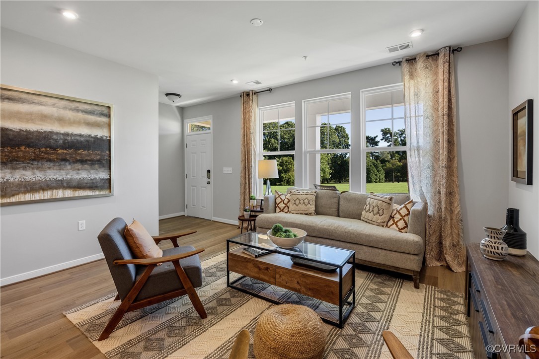 4112 Ebbies Crossing Midlothian, VA 23112 - Photo 3 of 38 a living room with furniture and a large window
