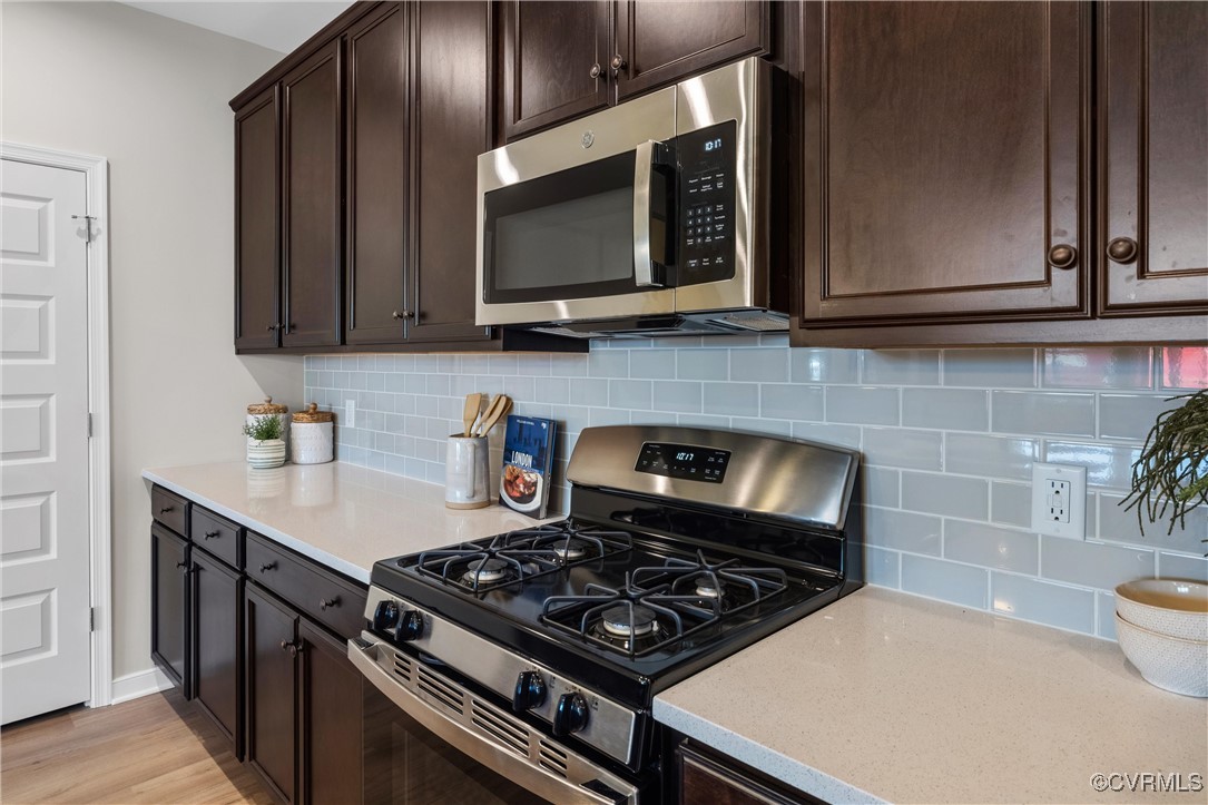 4112 Ebbies Crossing Midlothian, VA 23112 - Photo 8 of 38 a kitchen with a stove and a microwave