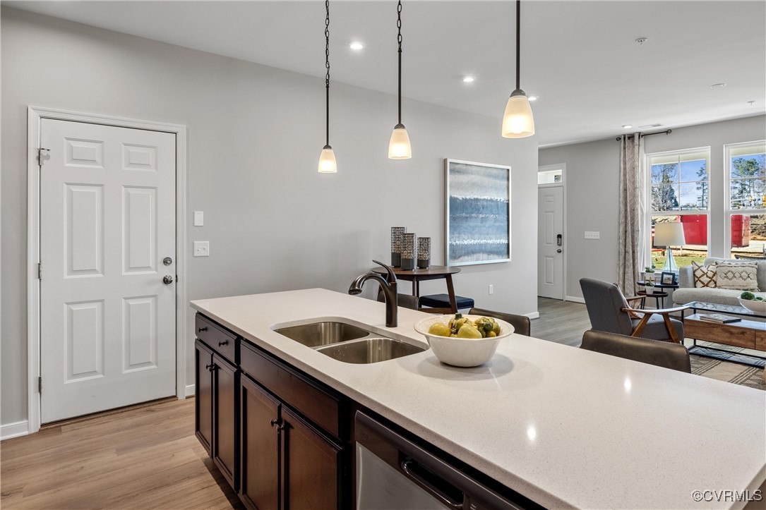4112 Ebbies Crossing Midlothian, VA 23112 - Photo 10 of 38 a kitchen with a sink a counter space and wooden floor