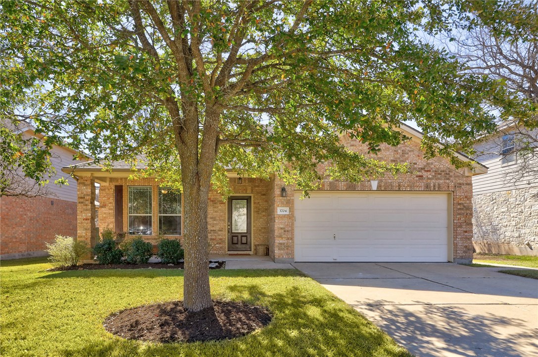 3704 Tall Cedars Road Cedar Park, TX 78613 - Photo 1 of 1 a front view of houses with yard