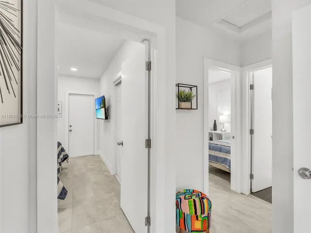 a view of entryway with wooden floor