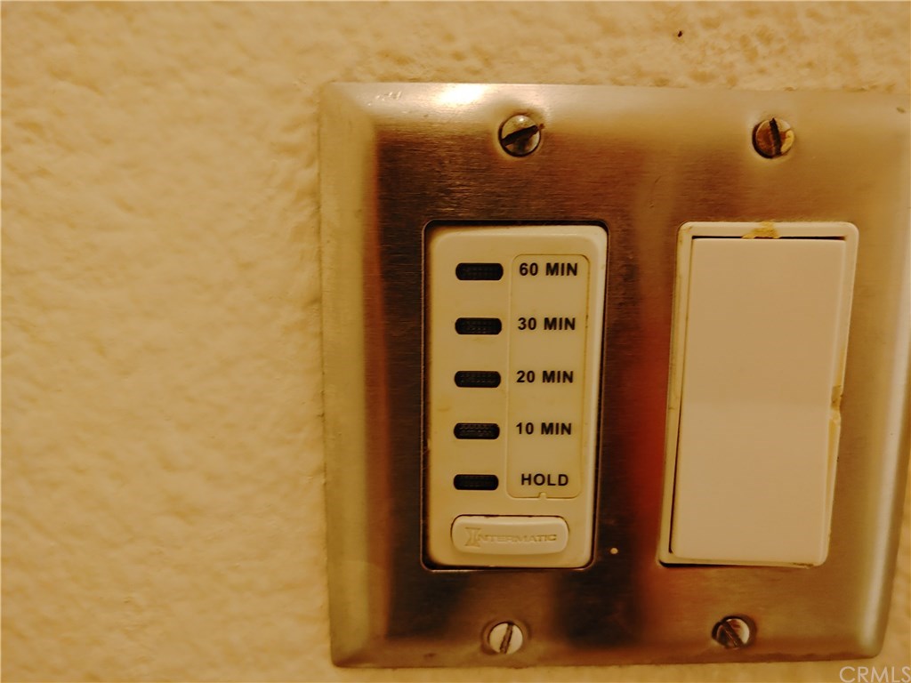 2811 South Fairview Street Santa Ana, CA 92704 - Photo 13 of 24 Bathroom light controls. upgraded lighting throughout.