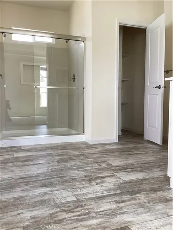 a view of a room that has a window in it