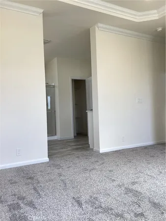 a view of a room that has a bench in it