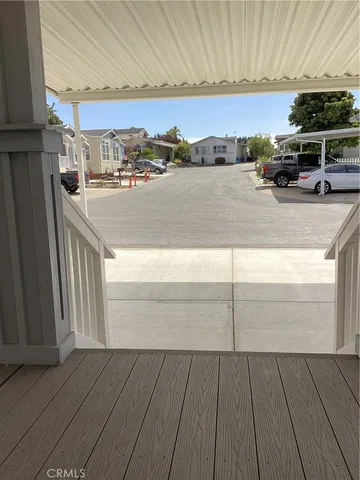 a view of living room with furniture and a fireplace