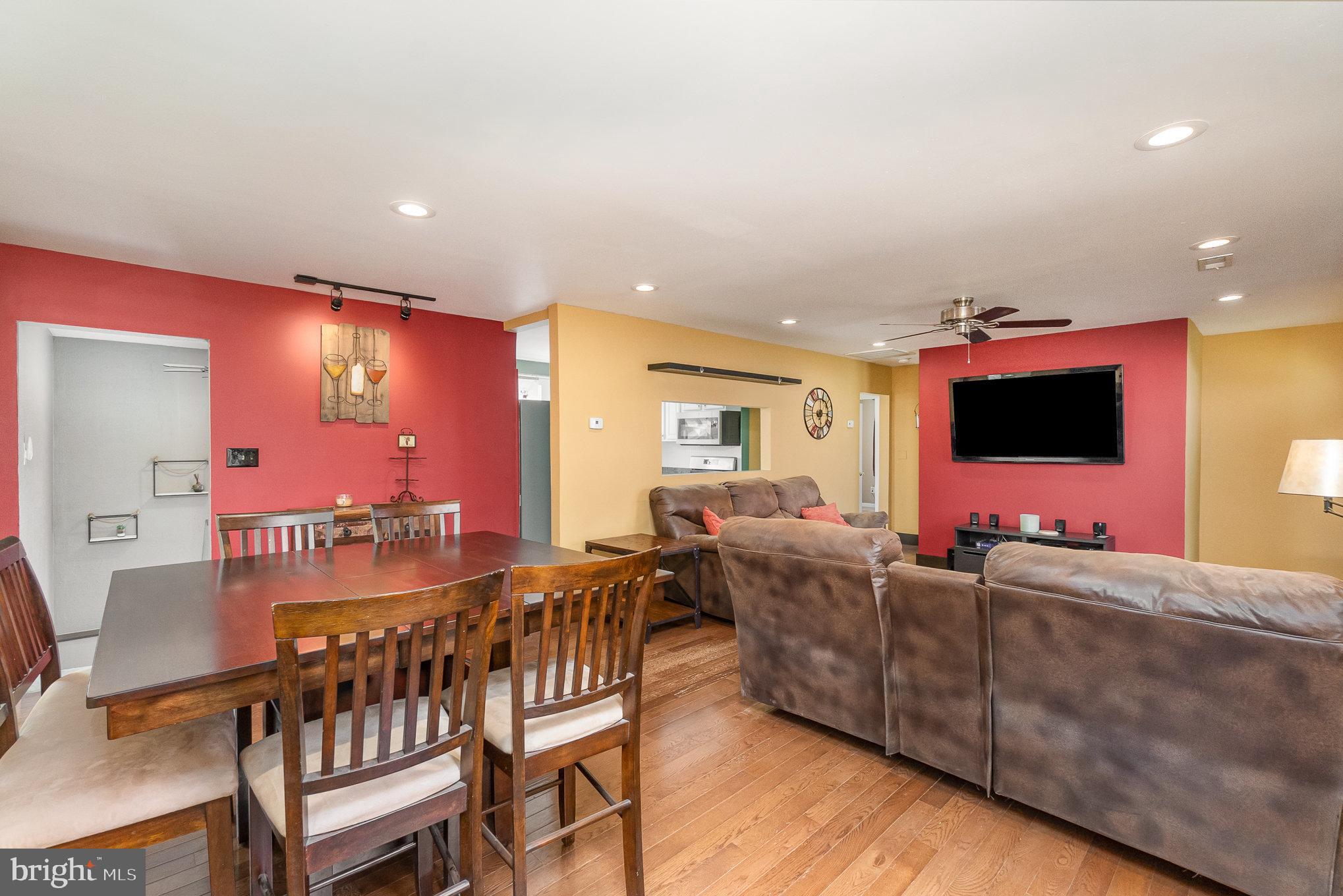 5813 Ebenezer Road White Marsh, MD 21162 - Photo 11 of 46 a living room with furniture and a flat screen tv