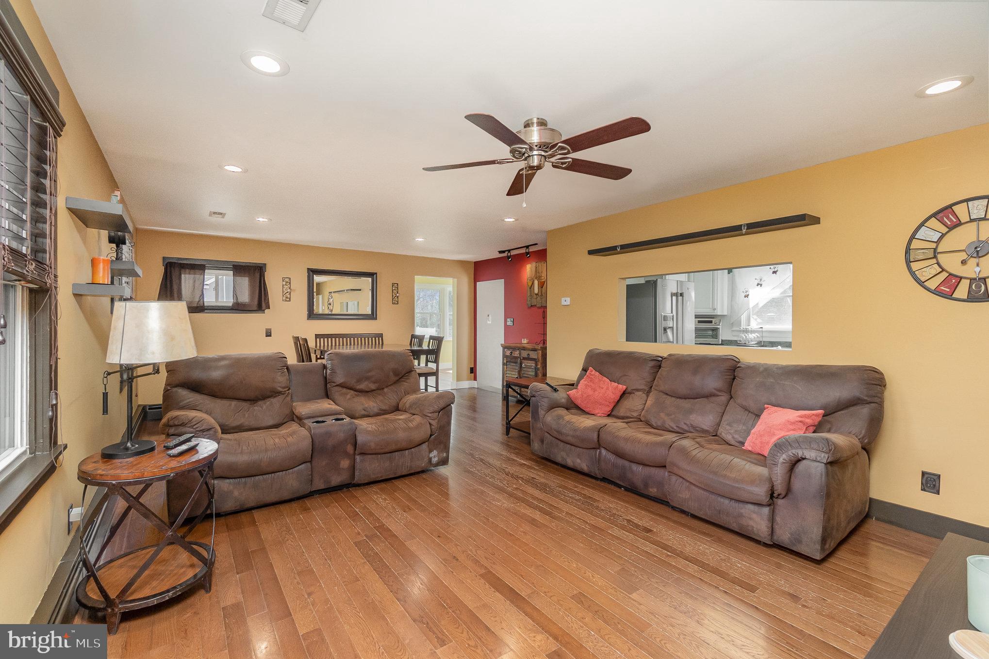 5813 Ebenezer Road White Marsh, MD 21162 - Photo 12 of 46 a living room with furniture and a window
