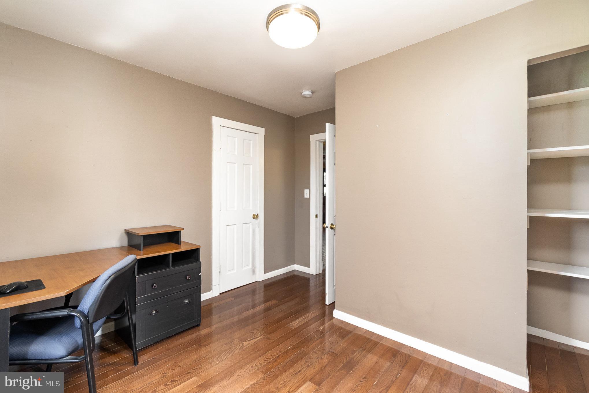 5813 Ebenezer Road White Marsh, MD 21162 - Photo 18 of 46 a view of room with wooden floor and bathroom