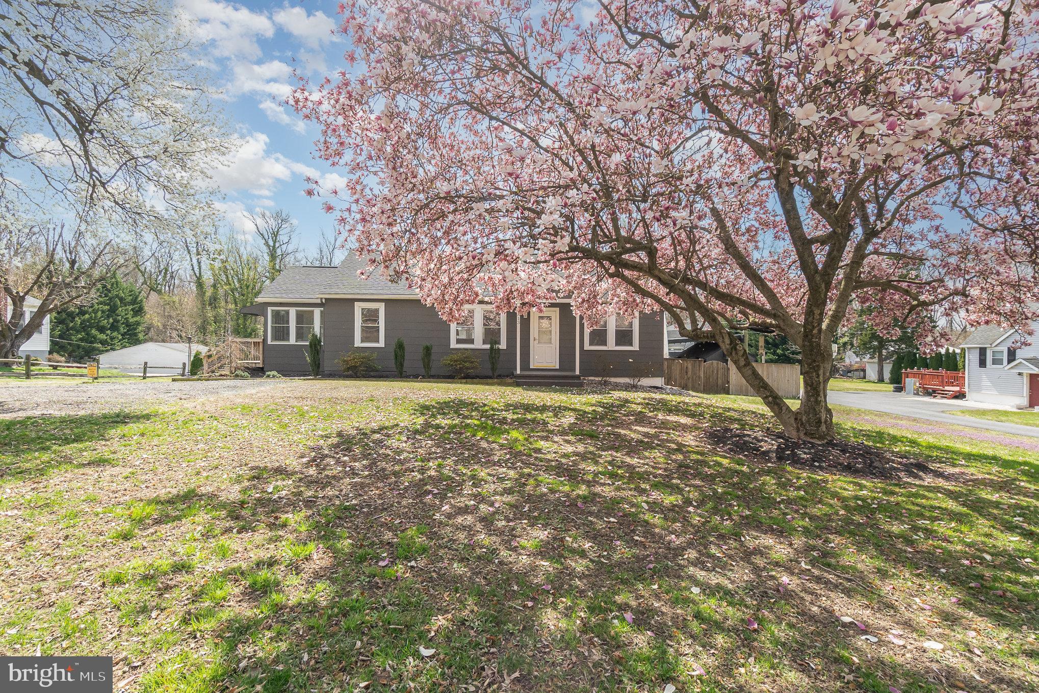 5813 Ebenezer Road White Marsh, MD 21162 - Photo 2 of 46 a front view of a house with a yard