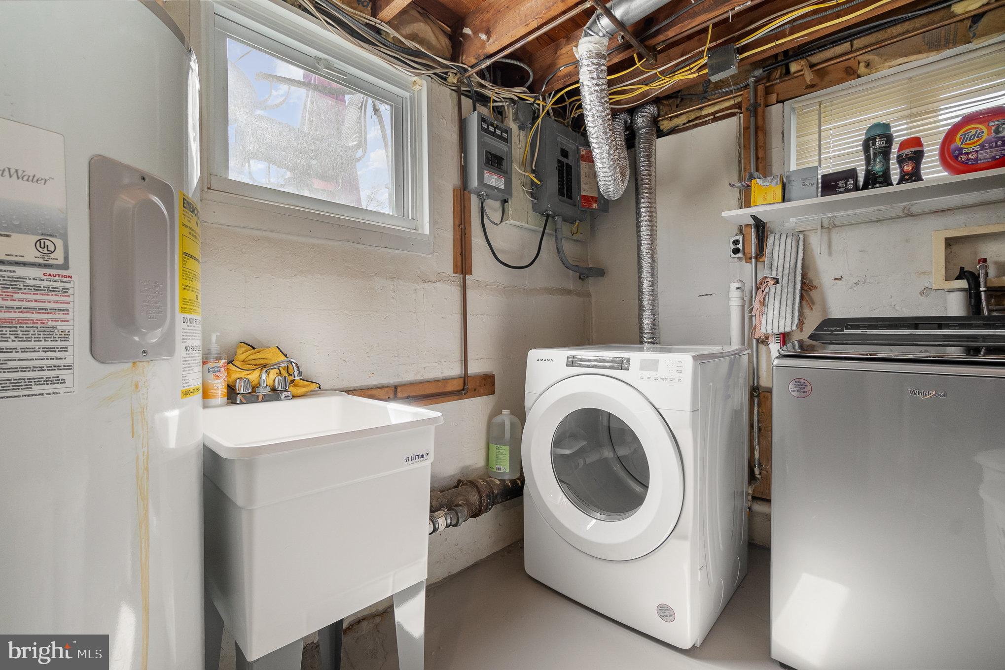 5813 Ebenezer Road White Marsh, MD 21162 - Photo 25 of 46 a utility room with dryer and washer