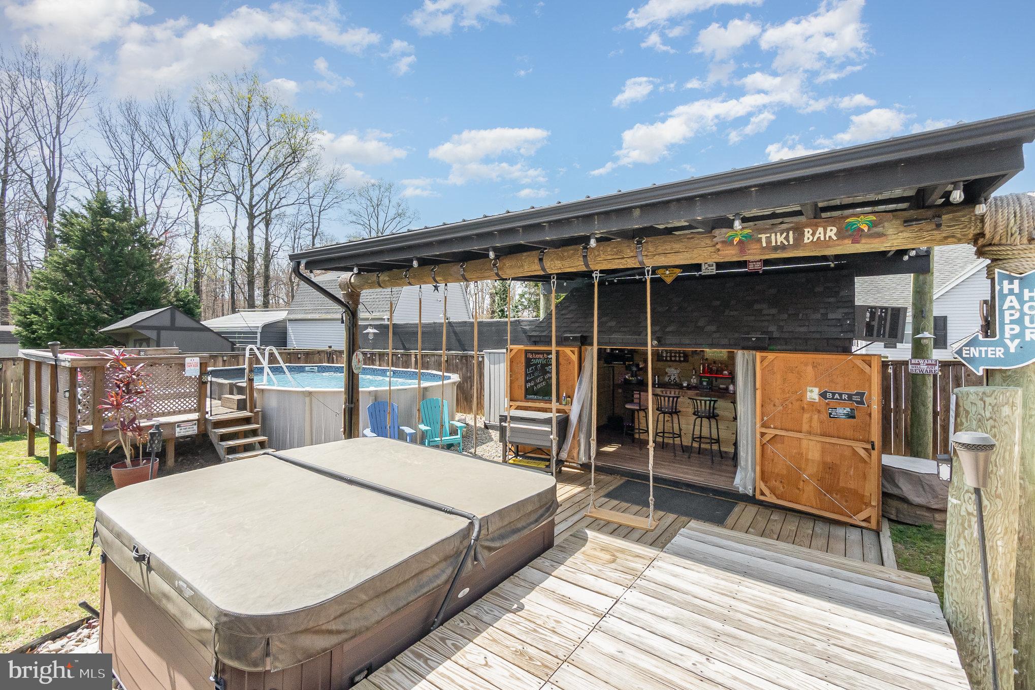 5813 Ebenezer Road White Marsh, MD 21162 - Photo 28 of 46 a large white building with a white roof and door