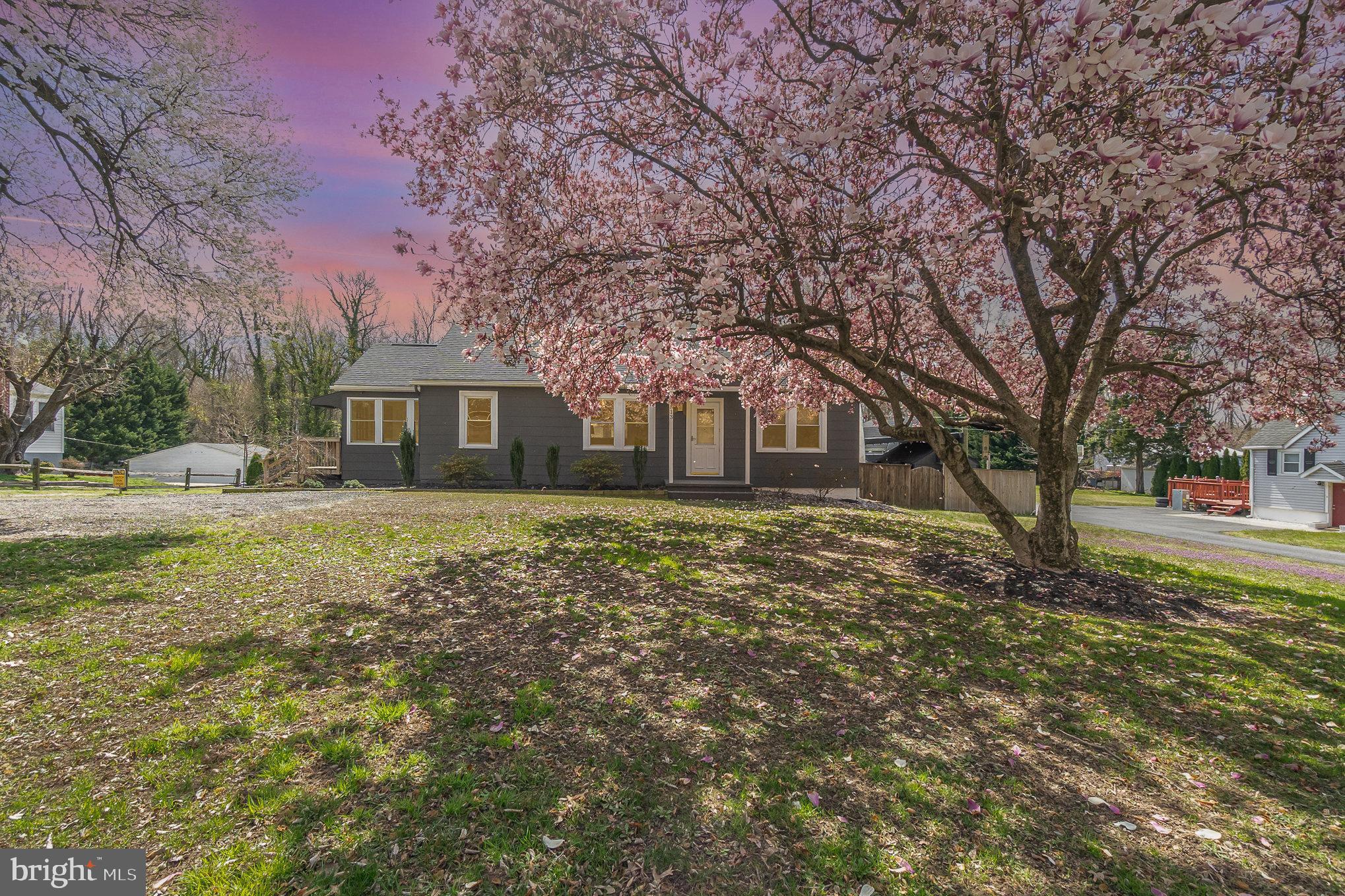 5813 Ebenezer Road White Marsh, MD 21162 - Photo 3 of 46 a front view of a house with a yard