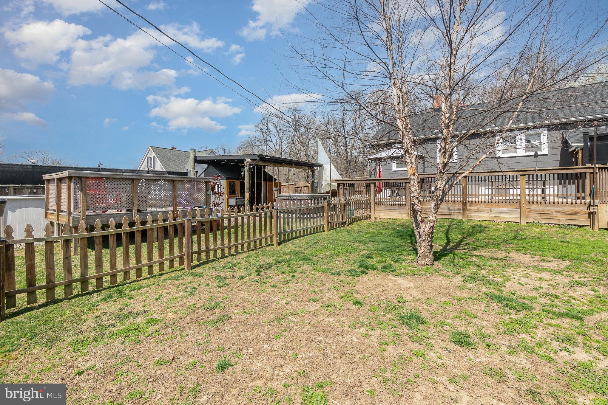5813 Ebenezer Road White Marsh, MD 21162 - Photo 33 of 46 a view of a house with a yard and pathway