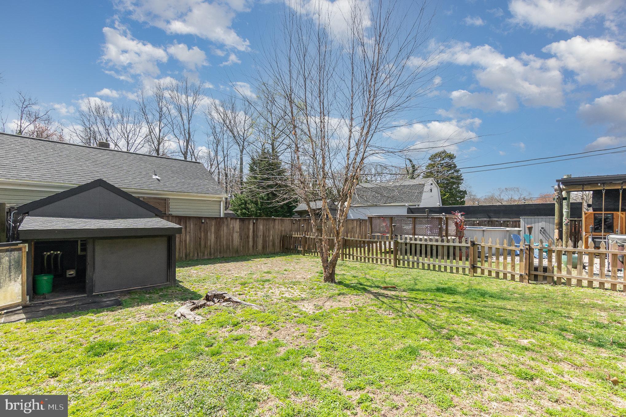 5813 Ebenezer Road White Marsh, MD 21162 - Photo 34 of 46 a view of a house with backyard and trees