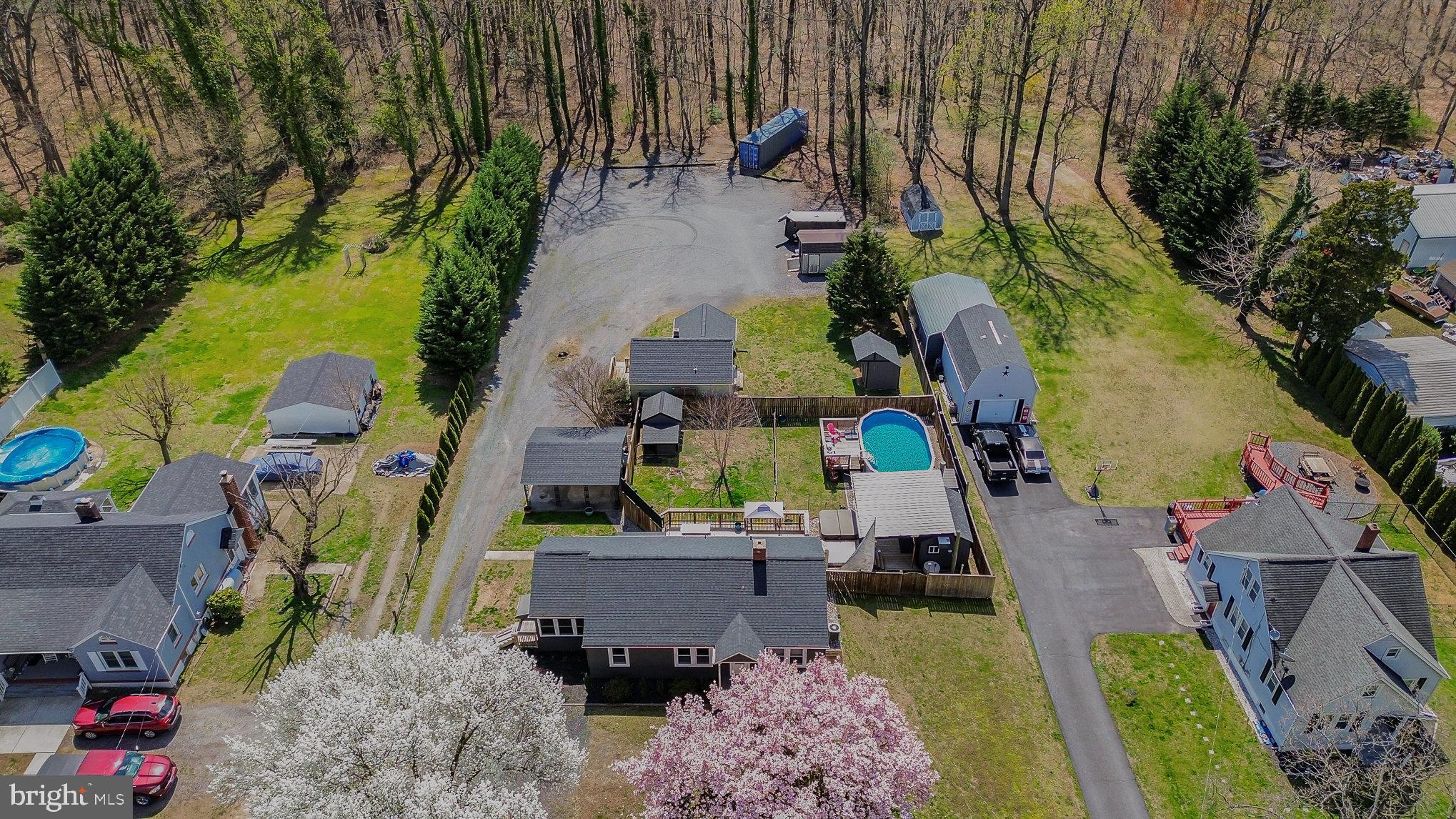 5813 Ebenezer Road White Marsh, MD 21162 - Photo 38 of 46 an aerial view of a house with a yard basket ball court and outdoor seating