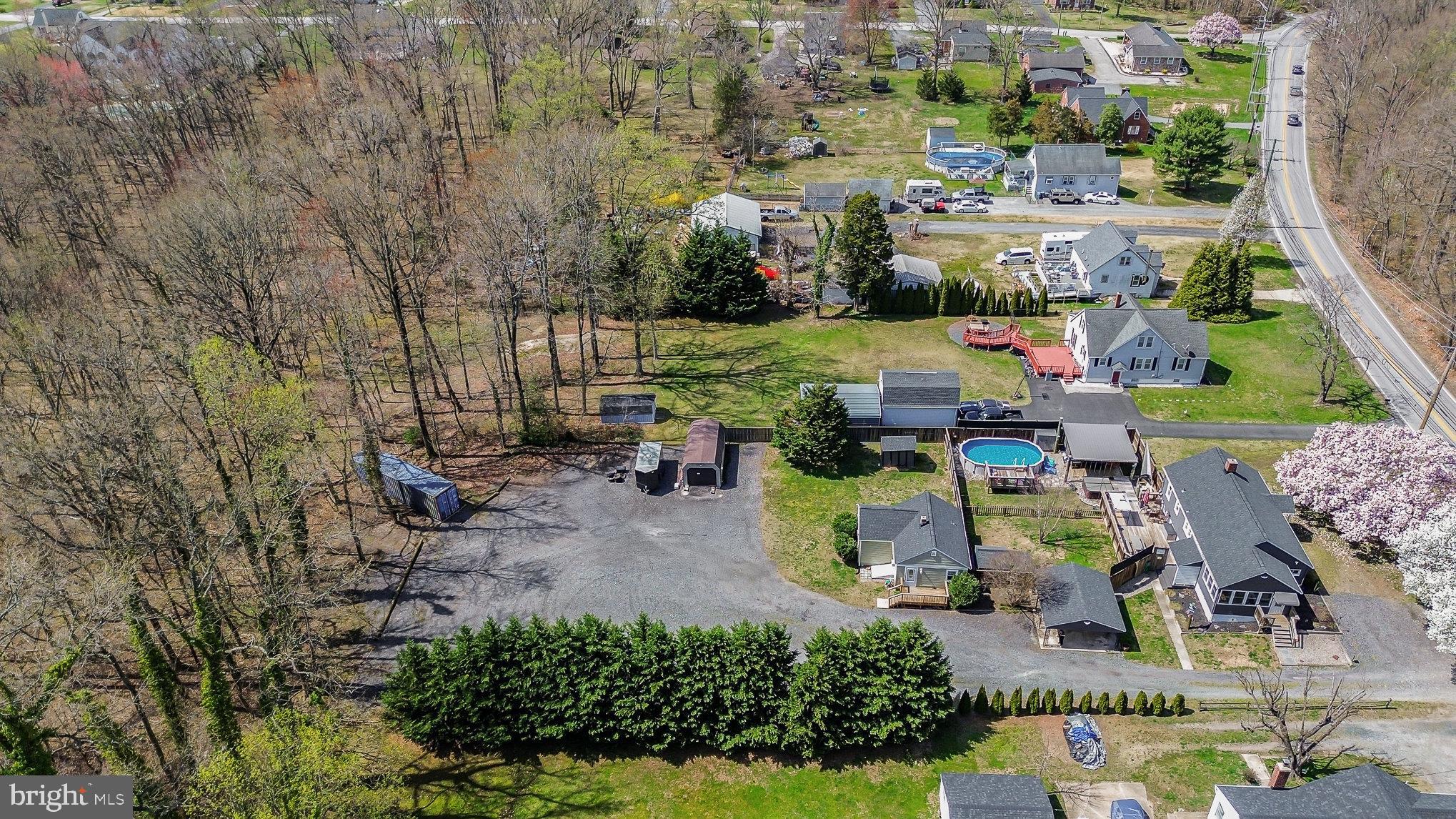 5813 Ebenezer Road White Marsh, MD 21162 - Photo 42 of 46 an aerial view of a houses with yard