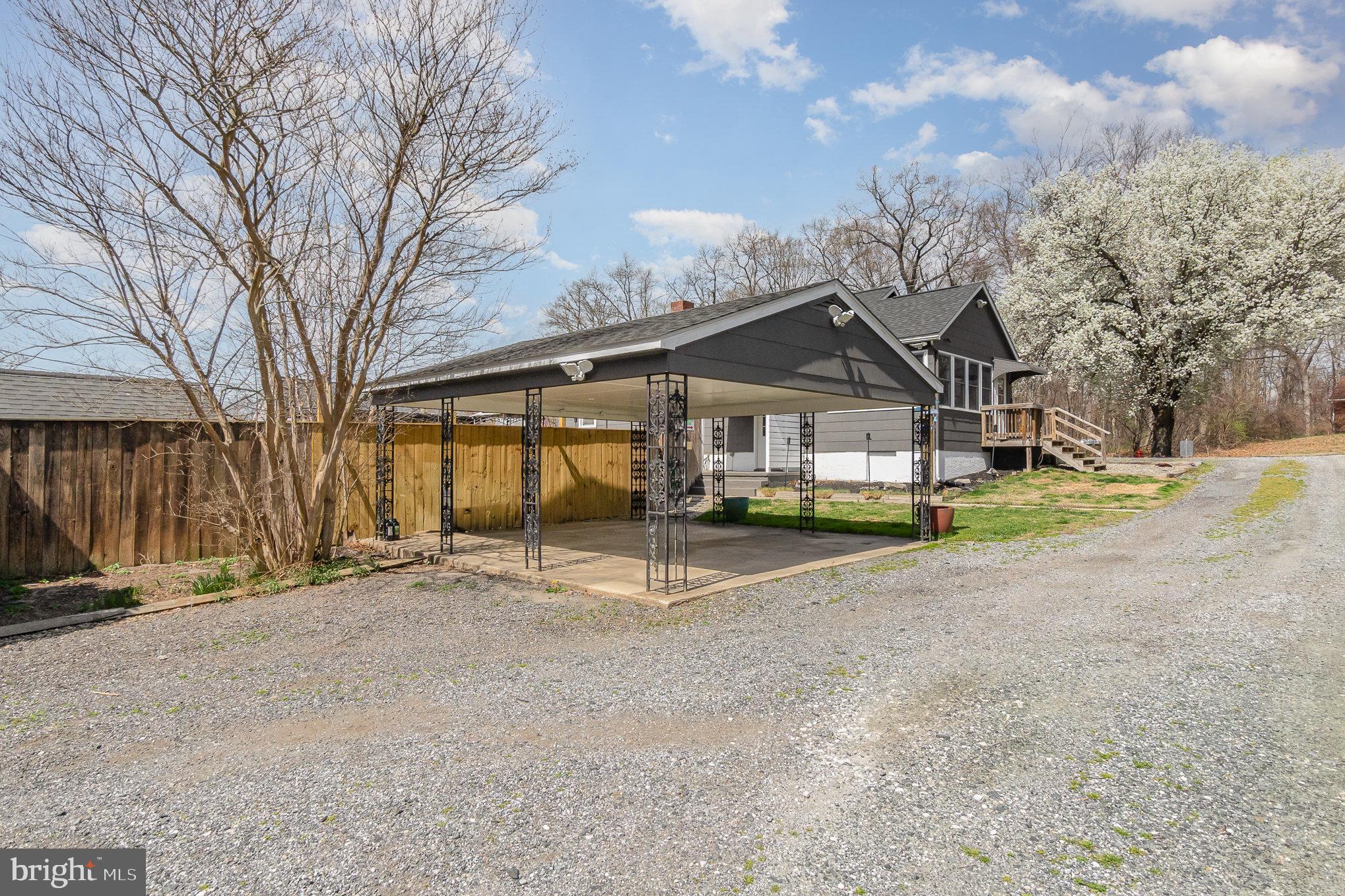 5813 Ebenezer Road White Marsh, MD 21162 - Photo 7 of 46 a house with trees in front of it