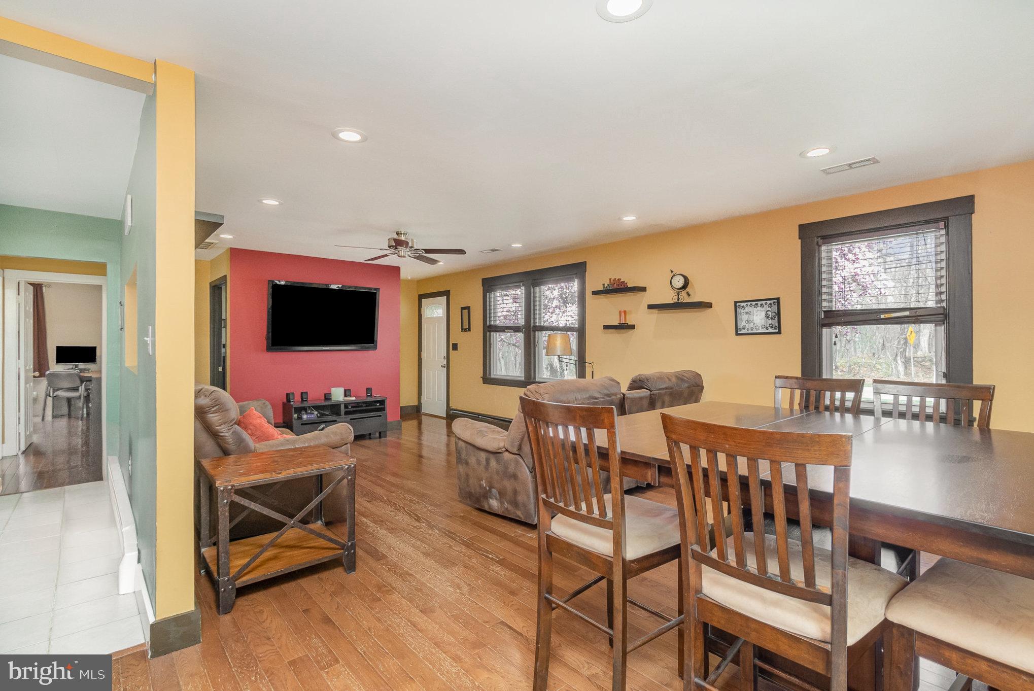 5813 Ebenezer Road White Marsh, MD 21162 - Photo 10 of 46 a view of a dining room with furniture window and wooden floor