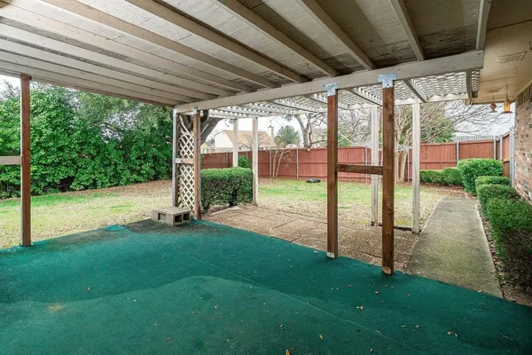 a view of a porch with a backyard
