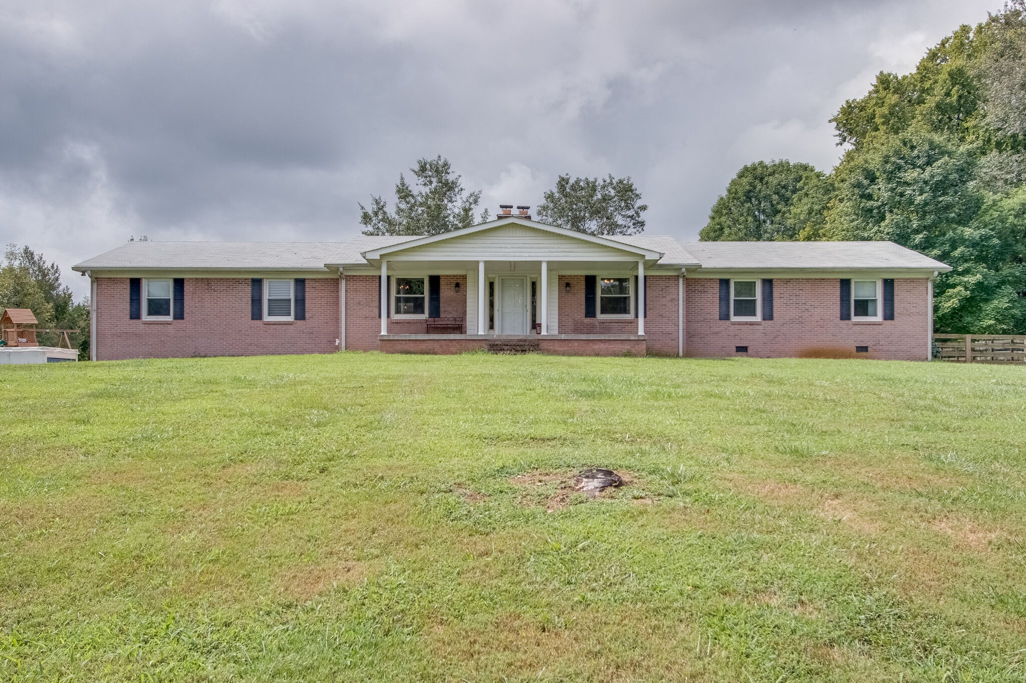 4543 South Carothers Road Franklin, TN 37064 - Photo 2 of 34 front view of a house with a yard