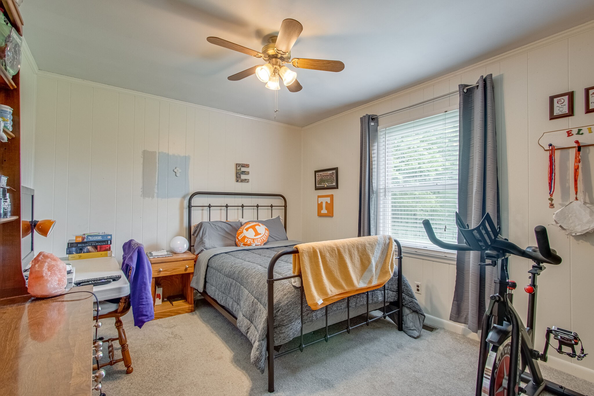 4543 South Carothers Road Franklin, TN 37064 - Photo 19 of 34 a bedroom with a bed and a chandelier
