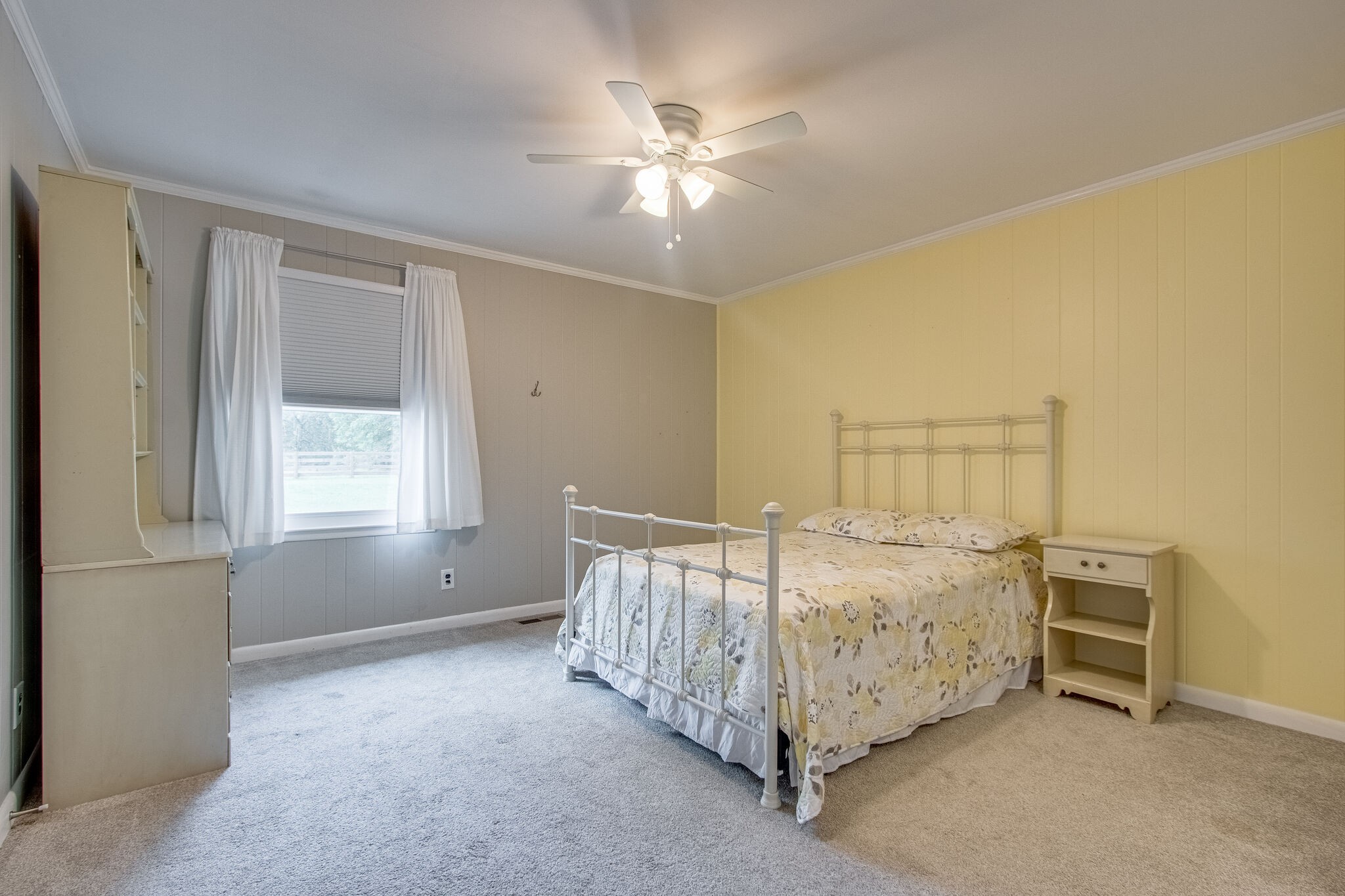 4543 South Carothers Road Franklin, TN 37064 - Photo 23 of 34 a bed room with a bed and a ceiling fan