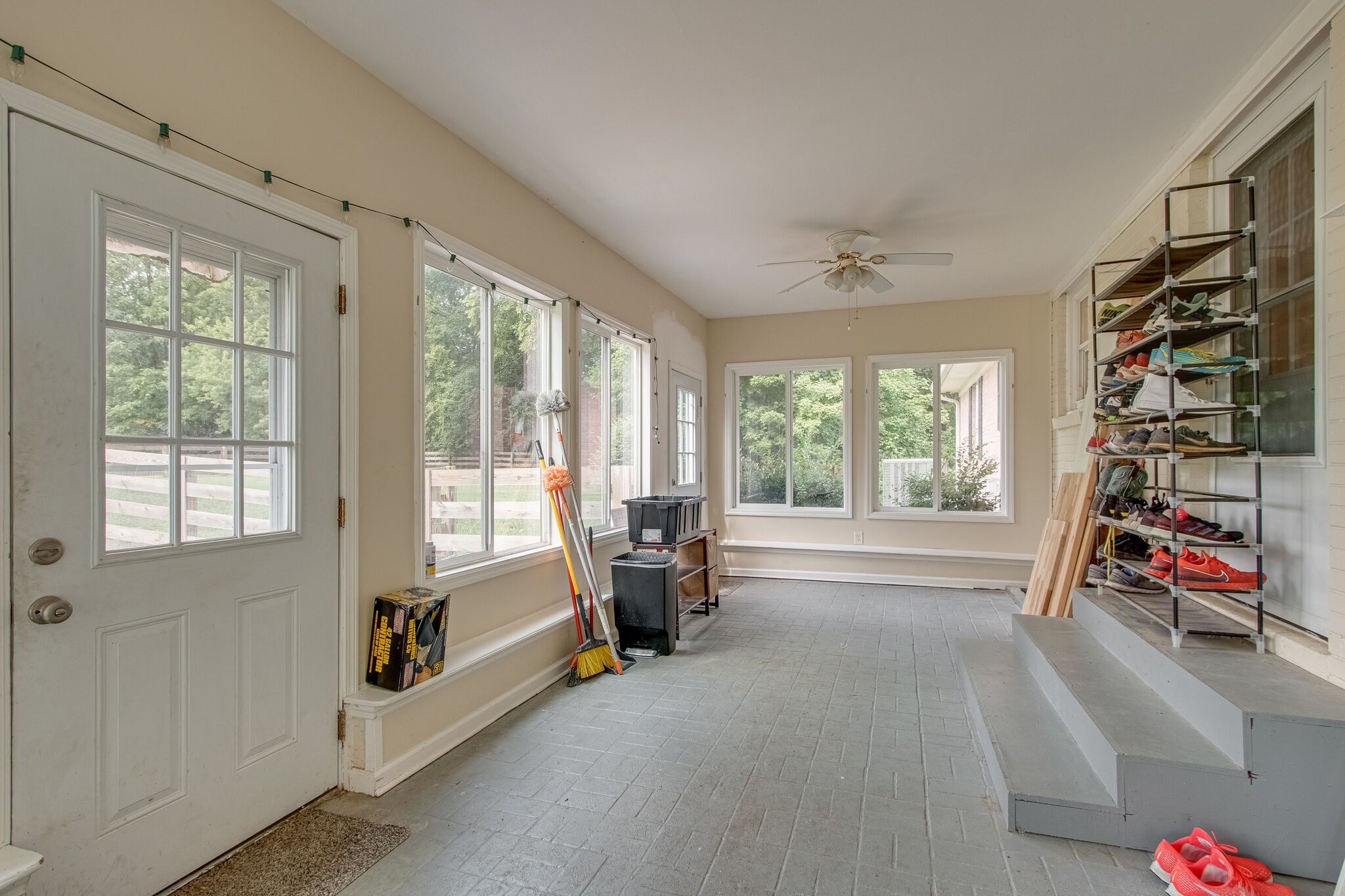 4543 South Carothers Road Franklin, TN 37064 - Photo 29 of 34 a living room with furniture and a large window