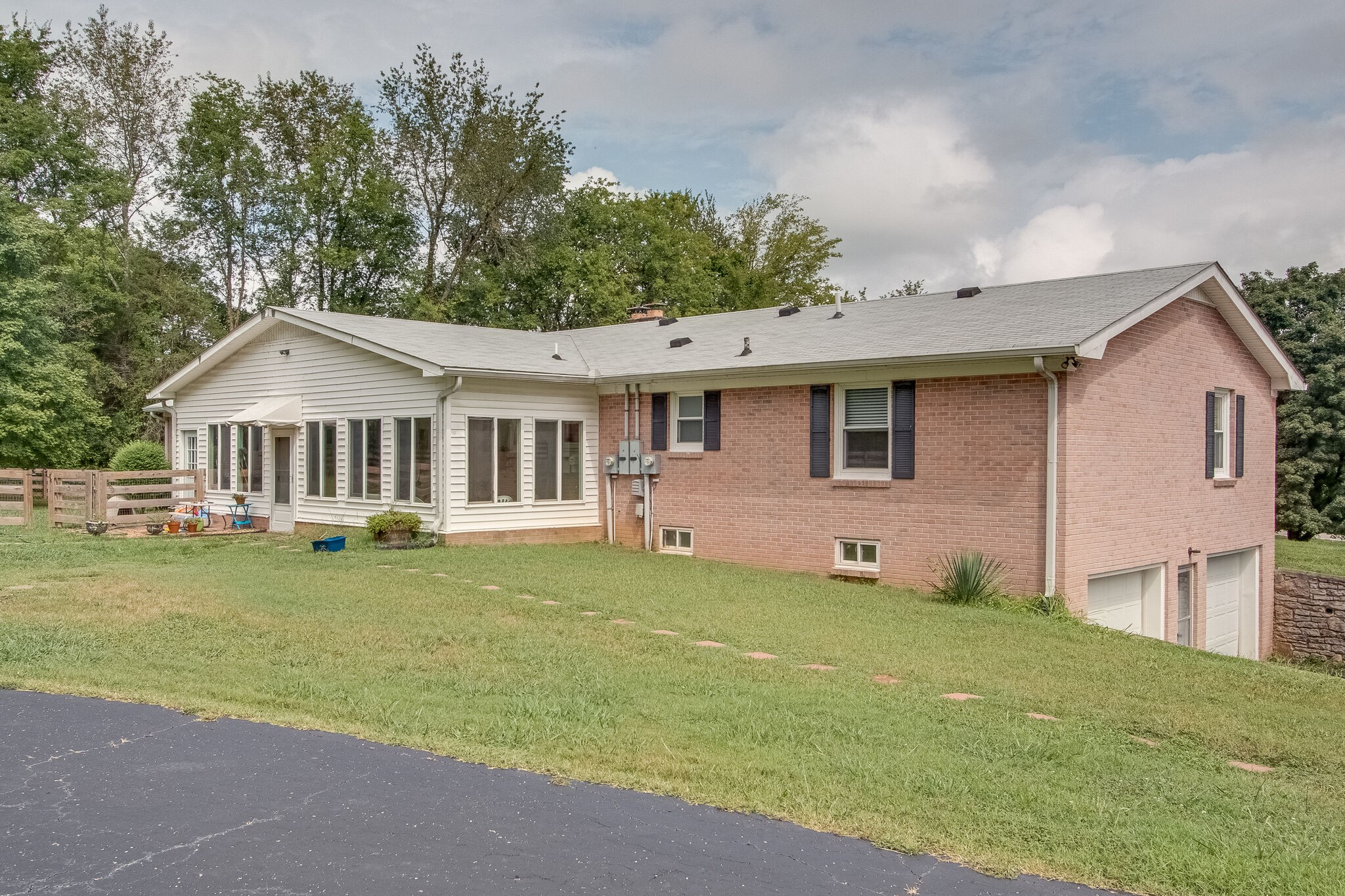 4543 South Carothers Road Franklin, TN 37064 - Photo 30 of 34 a front view of a house with a garden