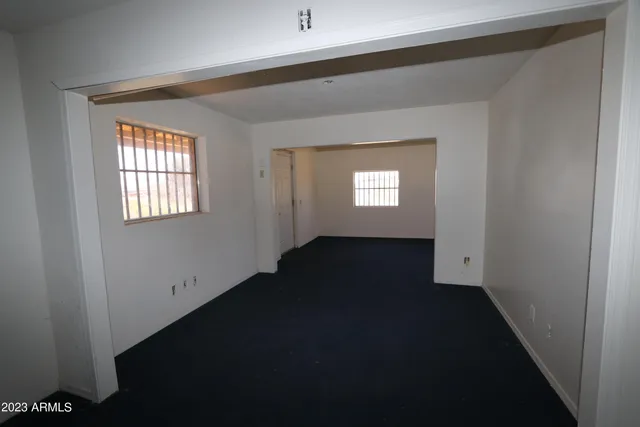 a view of an empty room and window