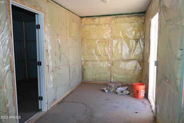 a view of a room with blue painted walls