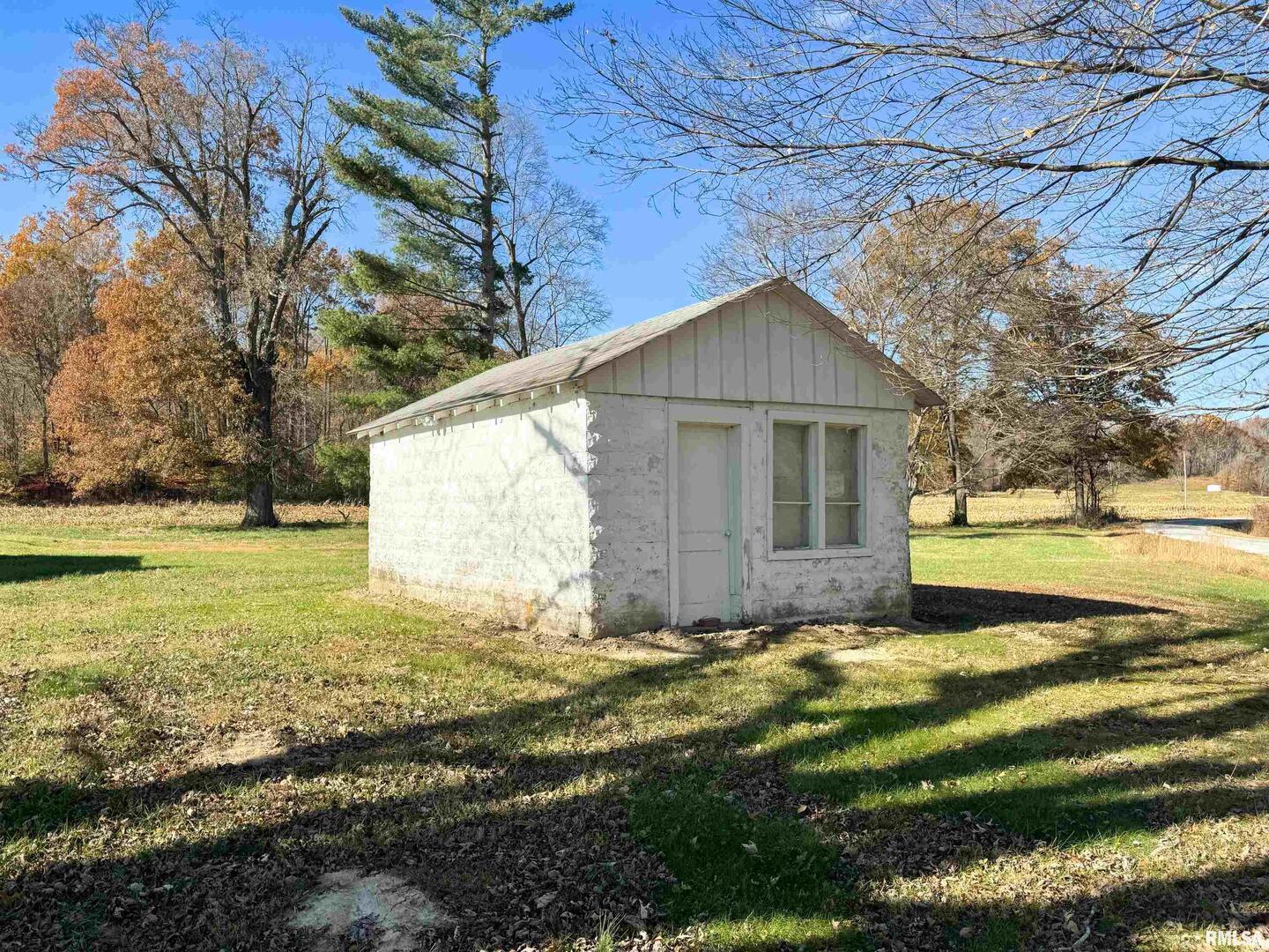 1325 Beech Grove Road Wolf Lake, IL 62998 - Photo 11 of 31 a view of a house with a yard