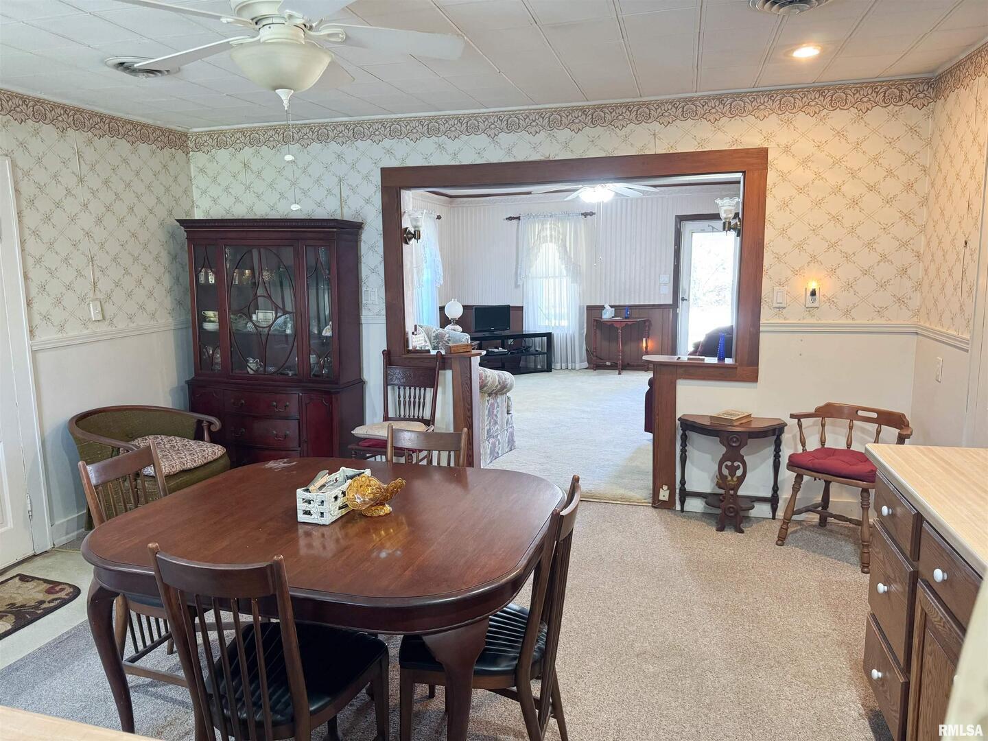 1325 Beech Grove Road Wolf Lake, IL 62998 - Photo 14 of 31 a view of a dining room with furniture and window