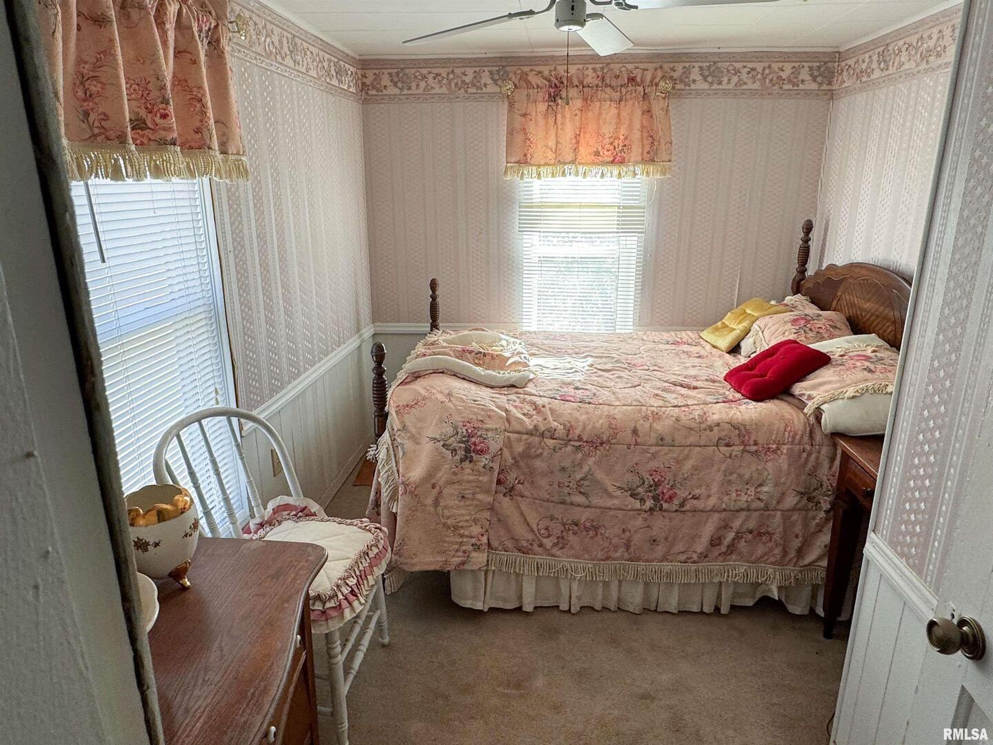 1325 Beech Grove Road Wolf Lake, IL 62998 - Photo 21 of 31 a bedroom with a bed and a window