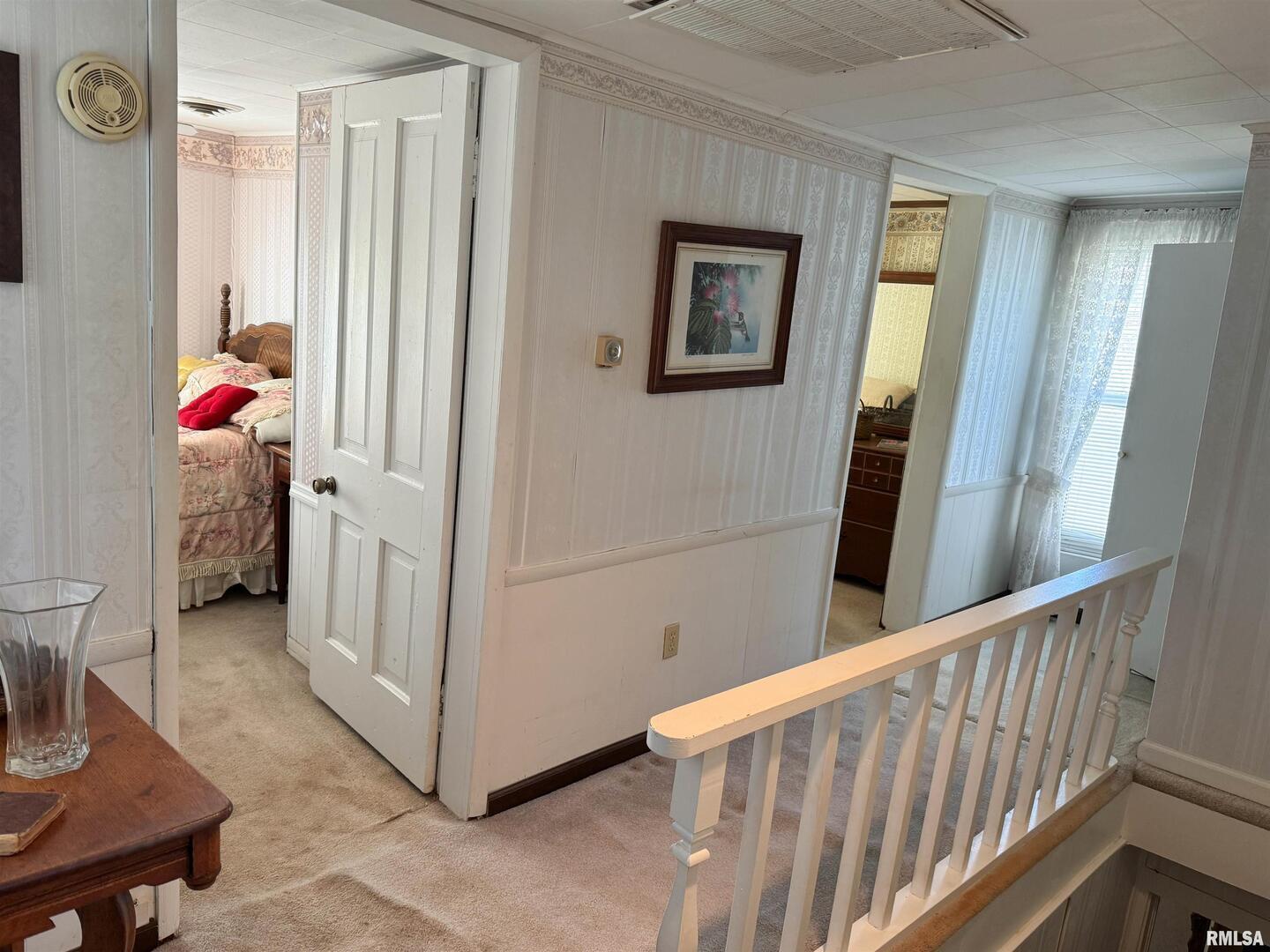 1325 Beech Grove Road Wolf Lake, IL 62998 - Photo 22 of 31 a view of a room with baby crib and toys